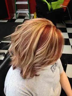 Chromasilk red lowlights with natural blonde highlights. Nat