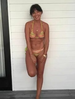 Davina McCall, 49, shows off incredible bikini body in throw