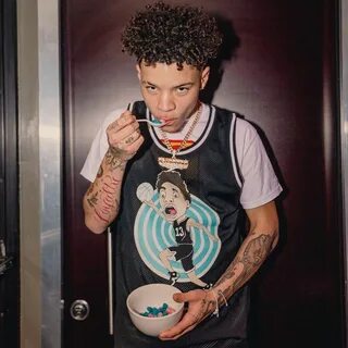 The tank top worn by Lil Mosey on his account Instagram @lil