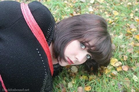Fully clothed woman is left on lawn while rope tied and clea