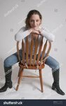 Woman Sitting Backwards Chair Stock Photo 11552902 Shutterst