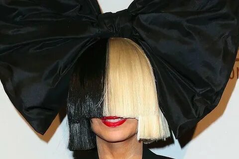 Sia was all smiles as she went wig-less through LAX