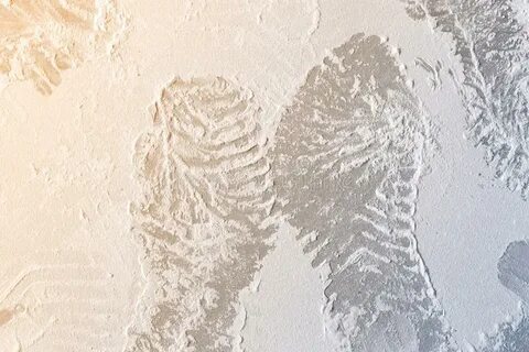 Footprints from Workers Shoes on the Dust from Construction 