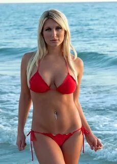 Brooke Hogan showing off in a sexy red bikini on the beach i