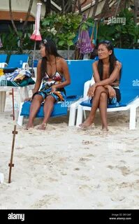 Young Thai Women on Patong Beach on Phuket Island, Thailand 