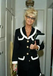 Mature teacher in glasses Vicki Vogue playing with a rubber 