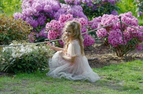 Little Girl and Pink Flowers in the Park - Free Stock Photo 