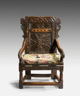 Jacobean Arm chair in carved oak