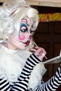 Girl putting on clown makeup Halloween costumes makeup, Scar