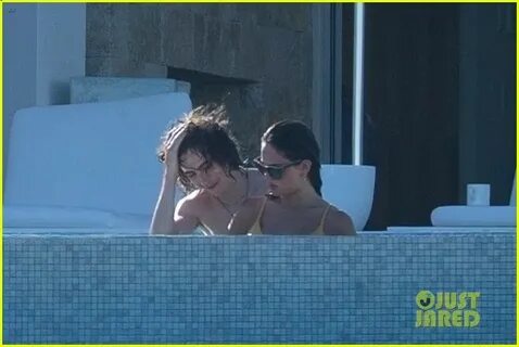 Timothee Chalamet & Eiza Gonzalez Get Steamy in the Pool Tog