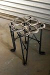 Augie made this welder's stool out of used horseshoes and re