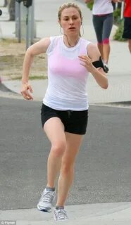 True Blood's Anna Paquin races around in a see-through T-shi