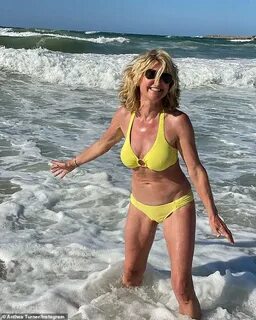 Anthea Turner, 60, shows off her figure in a tiny yellow bik