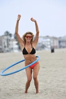 Estella Warren in a bikini with a hula hoop in Venice Beach 