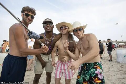 Spring breakers ditch masks and social distancing rules on S