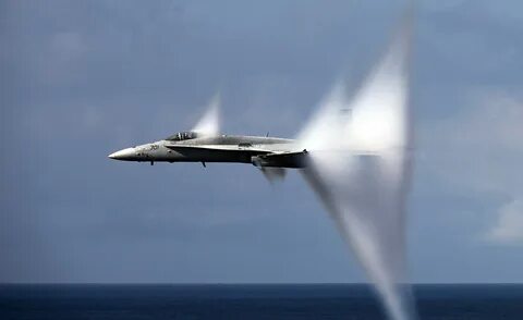 File:F-A-18C Hornet in transonic flight, with condensation c