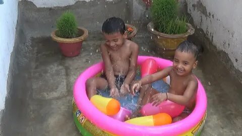 Kids Swimming In The Bathtub- Bath time for brother and baby