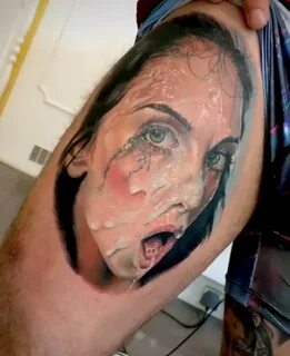 Tattoo cumshot