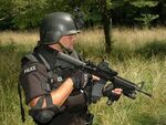 Police Tactical Officer with M4 Commando This Police Tacti. 