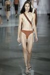 Pregnant glamour model walks the runway naked