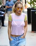 Rita Ora pictured in see-through T-shirt as she parades her 