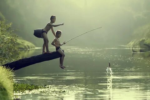 Asian boy fishing in a river. Boy fishing, Fishing pictures,