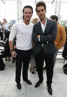 In good-looking company: The DJ joined Luke Evans and Jon Ko