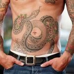 Snake stomach tattoo: generational calling to the truth, sly
