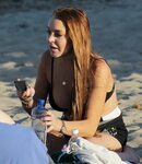 Lindsay Lohan - arriving to the beach in Malibu - August 12,