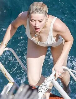 Amber Heard tits and ass in a sexy white swimsuit seen by pa