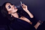 Premium Photo Elegant hot brunette woman smoking a cigarette