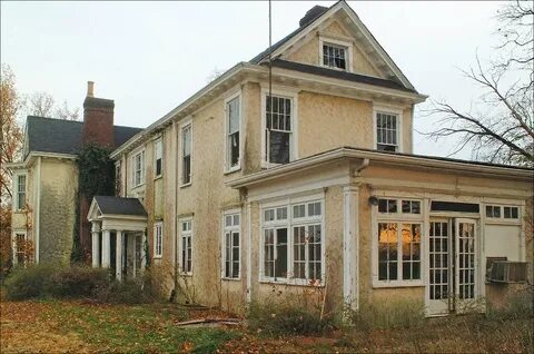 Plantation Inn 4 View from the rear. At right is a sun roo. 