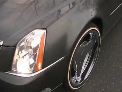 Cadillac Deville on 22' Custom Vogues Tires by THE TIRE SURG