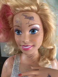 My 2yo turned her Barbie into a SoundCloud Rapper. - Imgur