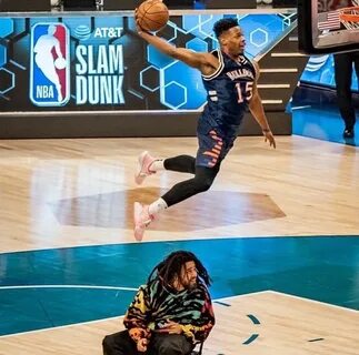 Des Smith jumping his hometown friend, J Cole, in the dunk c