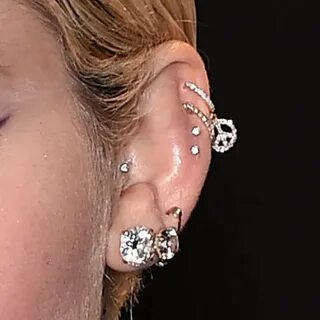 Miley Cyrus Piercings & Jewelry Steal Her Style