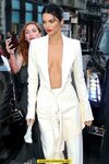 Kendall Jenner without bra under white jacket