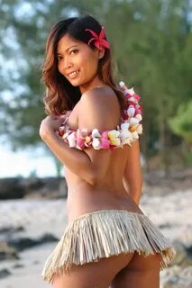 Classy Hawaiian babe in beads and waistcloth poses and plays