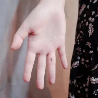 Tiny bolt tattoo on the inner finger. Finger tattoos, Mini t