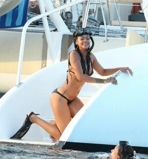 RIHANNA in Bikini at a Boat in Barbados - HawtCelebs