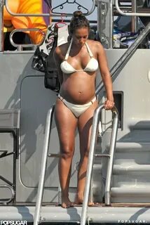 Alicia Keys bared her pregnant belly in a tiny white bikini 