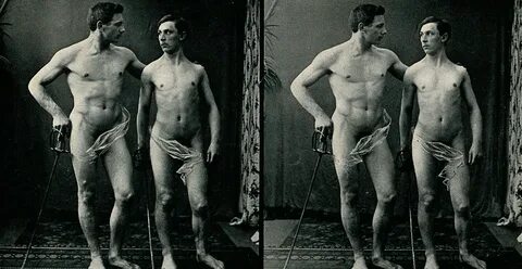 File:Two men posing naked in a photographic studio, standing