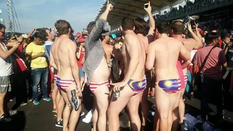 Aussies at F1 race arrested for stripping to Malaysian flag 