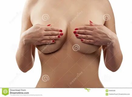 Female torso with hands covering breasts.