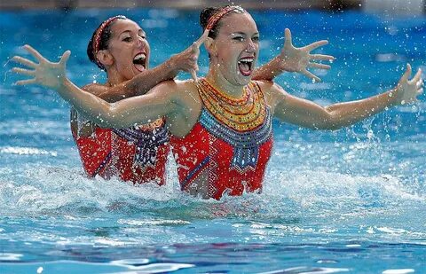 Photos: Synchronized swimmers will have you seeing double in