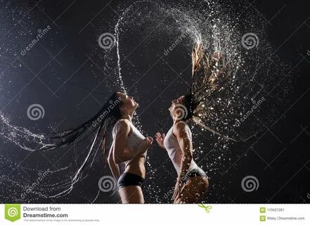 Women in Wet Underwear Having Shower Together Stock Image - 