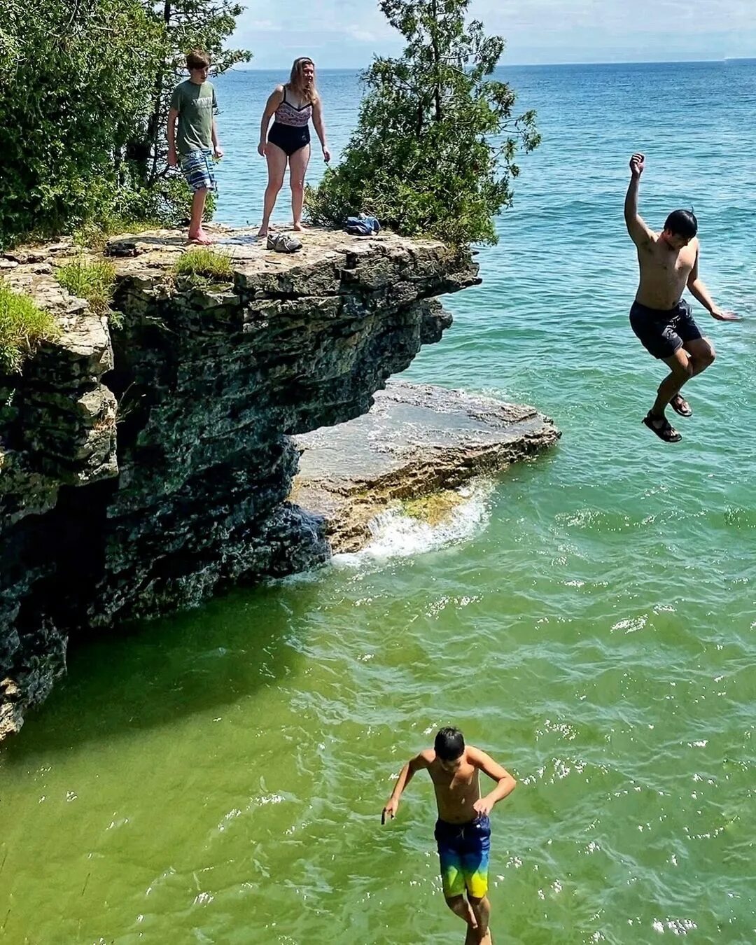 Cliff Jumping at Cave Point 🪨 iPhone11Pro #raw_community #spicollective #r...