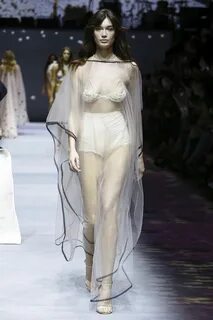 Model runway gif mourning dress boob window