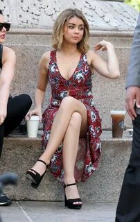 Sarah Hyland upskirt in a low cut red floral dress at the Mo
