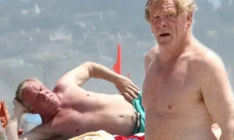 Nick Nolte reveals impressive physique as he sunbathes shirt